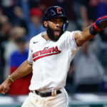 Amed Rosario #1 of the Cleveland Guardians celebrates after scoring on a single off the bat of Oscar Gonzalez in the sixth inning of game two of a doubleheader against the Texas Rangers at Progressive Field on June 07, 2022 in Cleveland, Ohio. The Rangers defeated the Guardians 6-3.