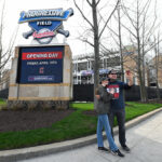 Fans shoot a photo in-front of the new Cleveland Guardians sign prior to the home opener against the San Francisco Giants at Progressive Field on April 15, 2022 in Cleveland, Ohio.