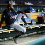 Amed Rosario #1 of the Cleveland Guardians sits in the dugout during the seventh inning of a game against the Detroit Tigers at Comerica Park on July 5, 2022, in Detroit, Michigan.