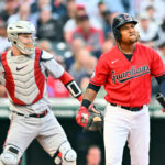 Jose Ramirez #11 of the Cleveland Guardians reacts after swinging for a strike during the fourth inning against the Minnesota Twins at Progressive Field on June 27, 2022 in Cleveland, Ohio.