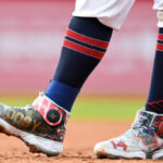 A closeup view of the cleats worn by Josh Naylor #22 of the Cleveland Guardians honoring Larry Doby, the first black baseball player in the American League, during the third inning in game two of a doubleheader against the New York Yankees at Progressive Field on July 2, 2022 in Cleveland, Ohio.