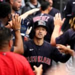 Steven Kwan #38 of the Cleveland Guardians celebrates in the dugout after hitting a solo home run against the Chicago White Sox in the ninth inning at Guaranteed Rate Field on July 24, 2022 in Chicago, Illinois.