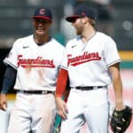Tyler Freeman #2 and Owen Miller #6 of the Cleveland Guardians celebrate a 7-4 win against the Arizona Diamondbacks at Progressive Field on August 03, 2022 in Cleveland, Ohio.