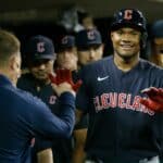 Oscar Gonzalez #39 of the Cleveland Guardians celebrates after scoring against the Cleveland Guardians during the eighth inning at Comerica Park on August 9, 2022, in Detroit, Michigan.