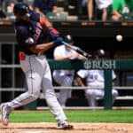 Amed Rosario #1 of the Cleveland Guardians hits a two run single in the fifth inning against the Chicago White Sox during game one of a doubleheader at Guaranteed Rate Field on July 23, 2022 in Chicago, Illinois.