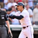 Andres Gimenez #0 of the Cleveland Guardians celebrates his three-run home run in the seventh inning of the first game of a doubleheader against the Detroit Tigers at Progressive Field on August 15, 2022 in Cleveland, Ohio.