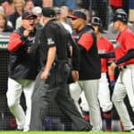 Terry Francona #77 of the Cleveland Guardians argues with home plate umpire Ron Kulpa #46 after being ejected in the eighth inning against the Los Angeles Angels at Progressive Field on September 12, 2022 in Cleveland, Ohio.