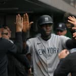 Estevan Florial #90 of the New York Yankees celebrates with teammates in the dugout after coming around to score on a RBI double by DJ LeMahieu #26 in the sixth inning during the game against the Pittsburgh Pirates at PNC Park on September 17, 2023 in Pittsburgh, Pennsylvania.