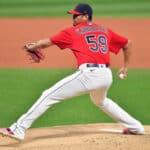 Starting pitcher Carlos Carrasco #59 of the Cleveland Indians pitches during the first inning of Game Two of the American League Wild Card Series against the New York Yankees at Progressive Field on September 30, 2020 in Cleveland, Ohio.