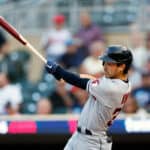 Steven Kwan #38 of the Cleveland Guardians hits a single against the Minnesota Twins in the first inning at Target Field on August 29, 2023 in Minneapolis, Minnesota.