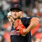Tanner Bibee #61 of the Cleveland Guardians pitches in the first inning against the Houston Astros at Minute Maid Park on August 02, 2023 in Houston, Texas.