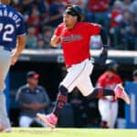 Josh Naylor #22 of the Cleveland Guardians scores past Jonathan Hernandez #72 of the Texas Rangers during the fourth inning at Progressive Field on September 17, 2023 in Cleveland, Ohio.