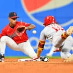 Shortstop Bryan Rocchio #6 of the Cleveland Guardians makes the tag on Noelvi Marte #16 of the Cincinnati Reds during the ninth inning at Progressive Field on September 27, 2023 in Cleveland, Ohio. The Guardians defeated the Reds 4-3.