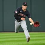 Myles Straw #7 of the Cleveland Guardians fields a ball hit into center field in the sixth inning against the Chicago White Sox at Guaranteed Rate Field on July 27, 2023 in Chicago, Illinois.