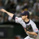 Shane Bieber #57 of the Cleveland Guardians pitches against the Oakland Athletics in the second inning at Oakland Coliseum on March 28, 2024 in Oakland, California.