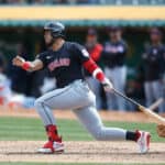 Gabriel Arias #13 of the Cleveland Guardians hits an RBI single in the top of the fourth inning against the Oakland Athletics at Oakland Coliseum on March 30, 2024 in Oakland, California.