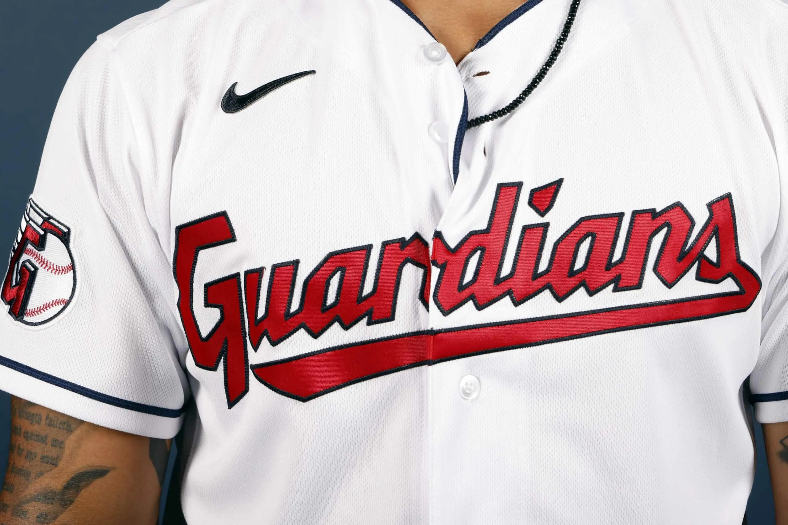 GOODYEAR, ARIZONA - MARCH 22: A detail view of the logo on the jersey worn by Bobby Bradley #44 of the Cleveland Guardians poses during Photo Day at Goodyear Ballpark on March 22, 2022 in Goodyear, Arizona.