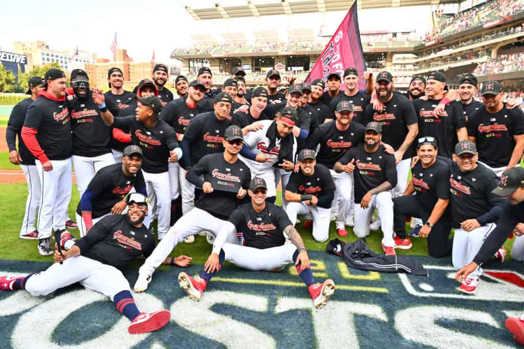 CLEVELAND, OHIO - OCTOBER 12: The Cleveland Guardians pose for a photo after defeating the Detroit Tigers in Game Five of the Division Series at Progressive Field on October 12, 2024 in Cleveland, Ohio