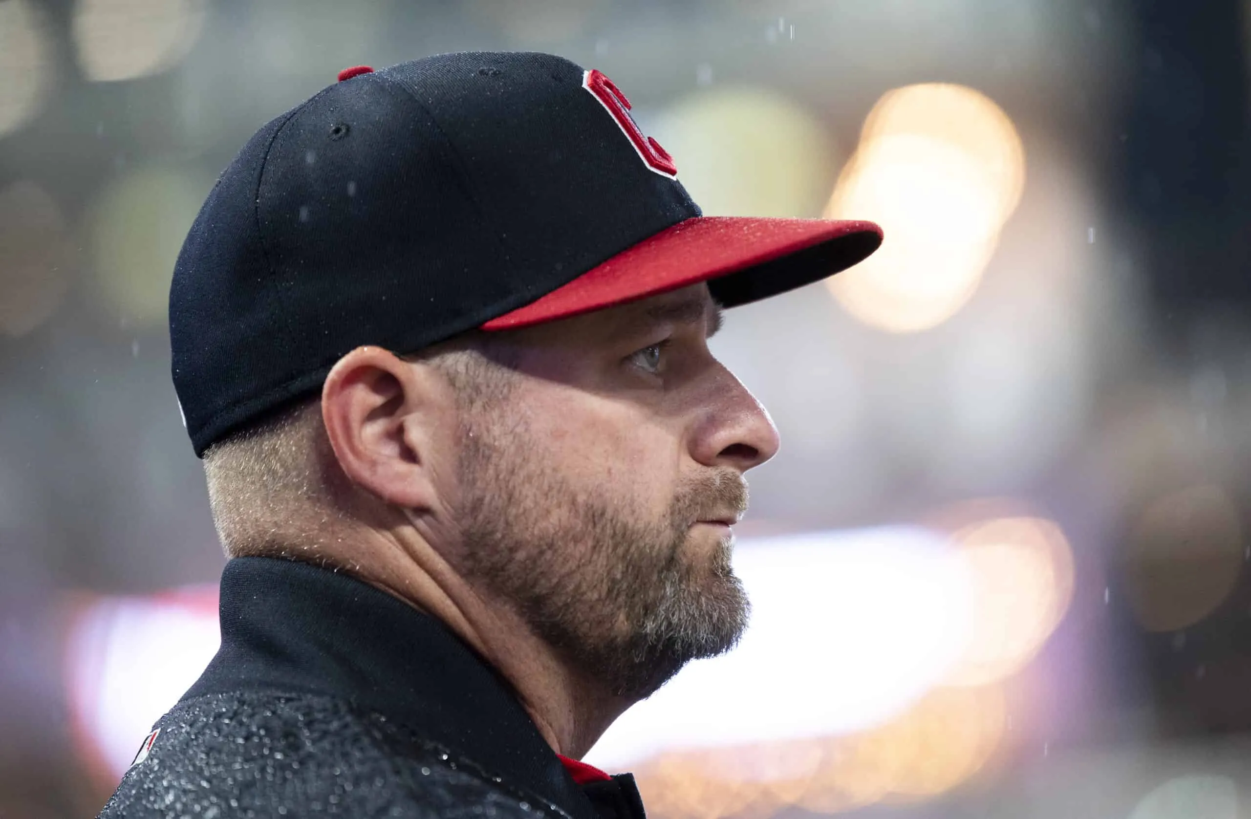 MINNEAPOLIS, MINNESOTA - MAY 19: Manager Stephen Vogt #12 of the Cleveland Guardians looks on during a rain delay in the top half of the fourth inning of the game against the Minnesota Twins at Target Field on May 19, 2025 in Minneapolis, Minnesota.
