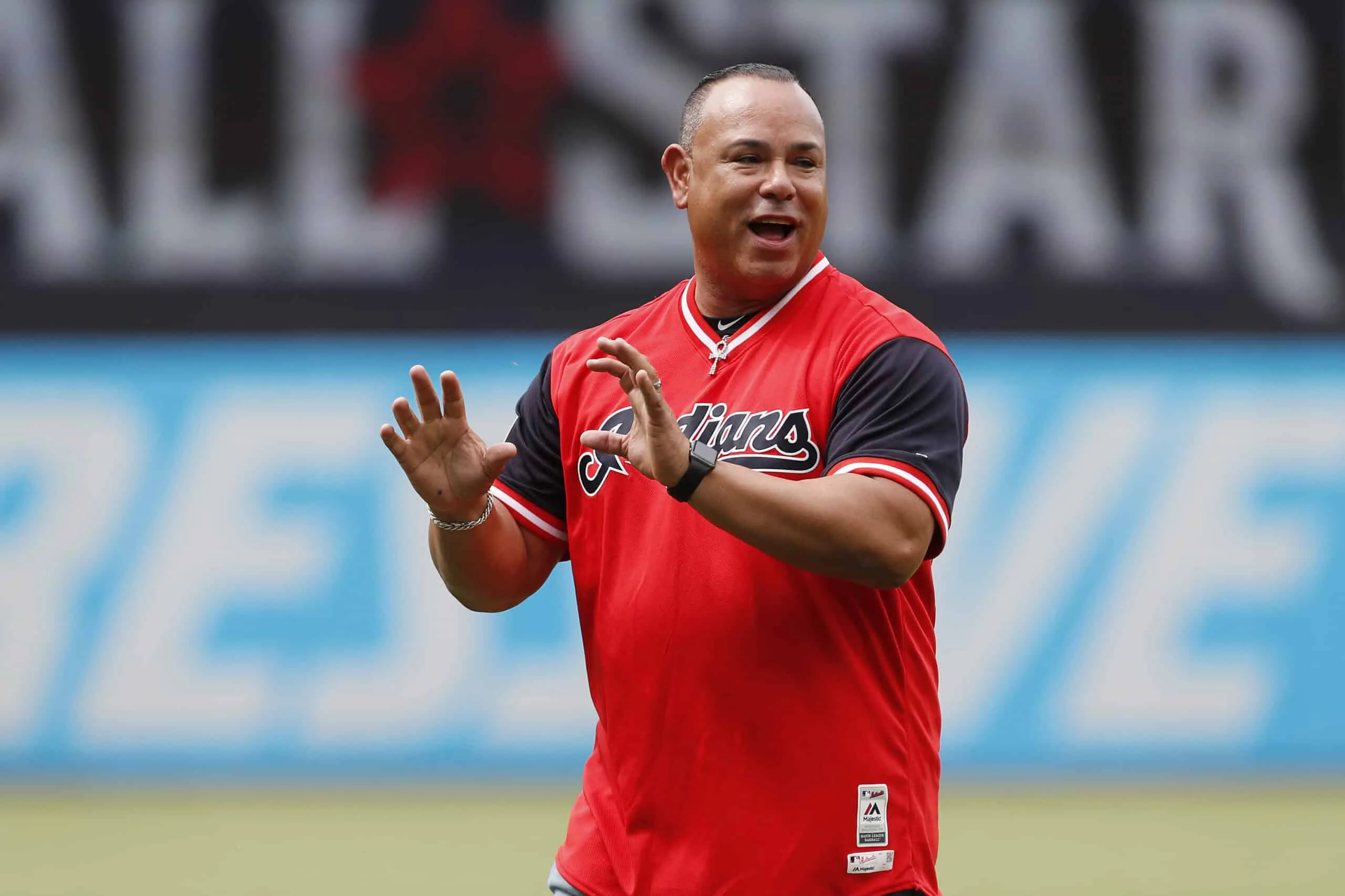 CLEVELAND, OH - JUNE 08: Former Cleveland Indians second baseman Carlos Baerga reacts after throwing out the ceremonial first pitch before the game against the New York Yankees in the first inning at Progressive Field on June 8, 2019 in Cleveland, Ohio. The Indians defeated the Yankees 8-4.