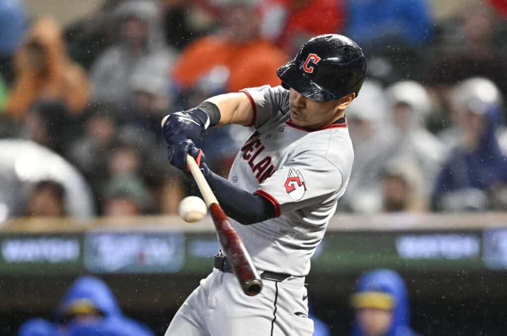MINNEAPOLIS, MINNESOTA - SEPTEMBER 19: Steven Kwan #38 of the Cleveland Guardians hits an RBI double against the Minnesota Twins in the ninth inning of the game at Target Field on September 19, 2025 in Minneapolis, Minnesota.