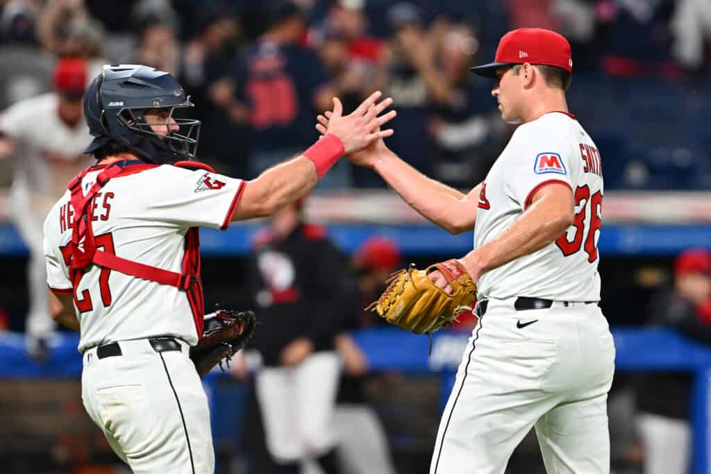 CLEVELAND, OHIO - SEPTEMBER 09: Catcher Austin Hedges #27 celebrates with closing pitcher Cade Smith #36 of the Cleveland Guardians after the game against the Kansas City Royals at Progressive Field on September 09, 2025 in Cleveland, Ohio. The Guardians defeated the Royals 2-0.