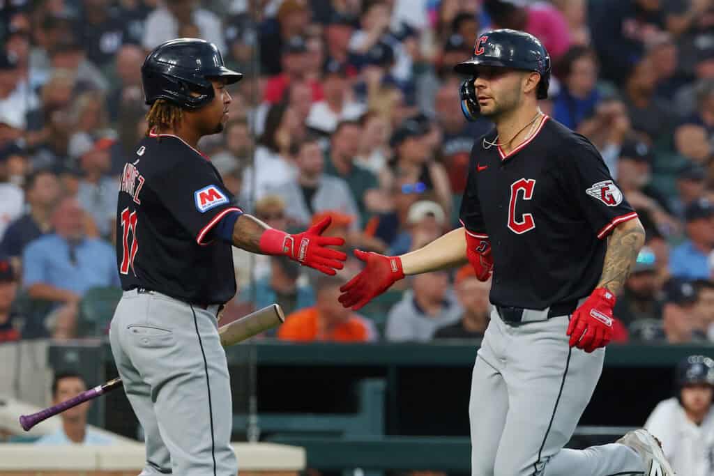 DETROIT, MICHIGAN - SEPTEMBER 17: C.J. Kayfus #63 of the Cleveland Guardians celebrates scoring a run with José Ramírez #11 in the third inning while playing the Detroit Tigers at Comerica Park on September 17, 2025 in Detroit, Michigan.