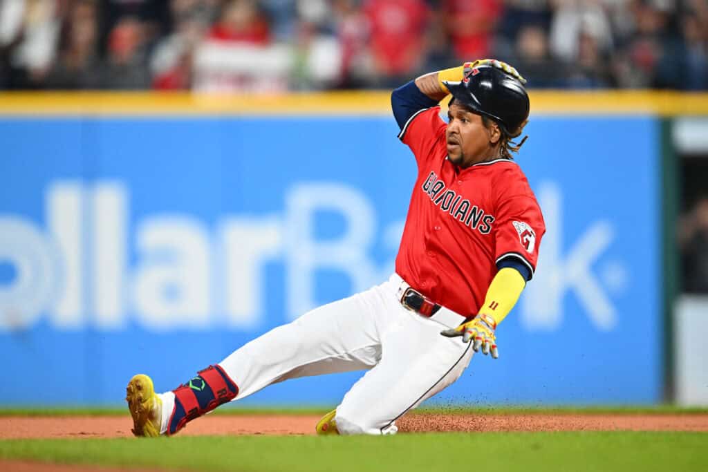 CLEVELAND, OHIO - SEPTEMBER 24: José Ramírez #11 of the Cleveland Guardians slides into second base during the first inning against the Detroit Tigers at Progressive Field on September 24, 2025 in Cleveland, Ohio.