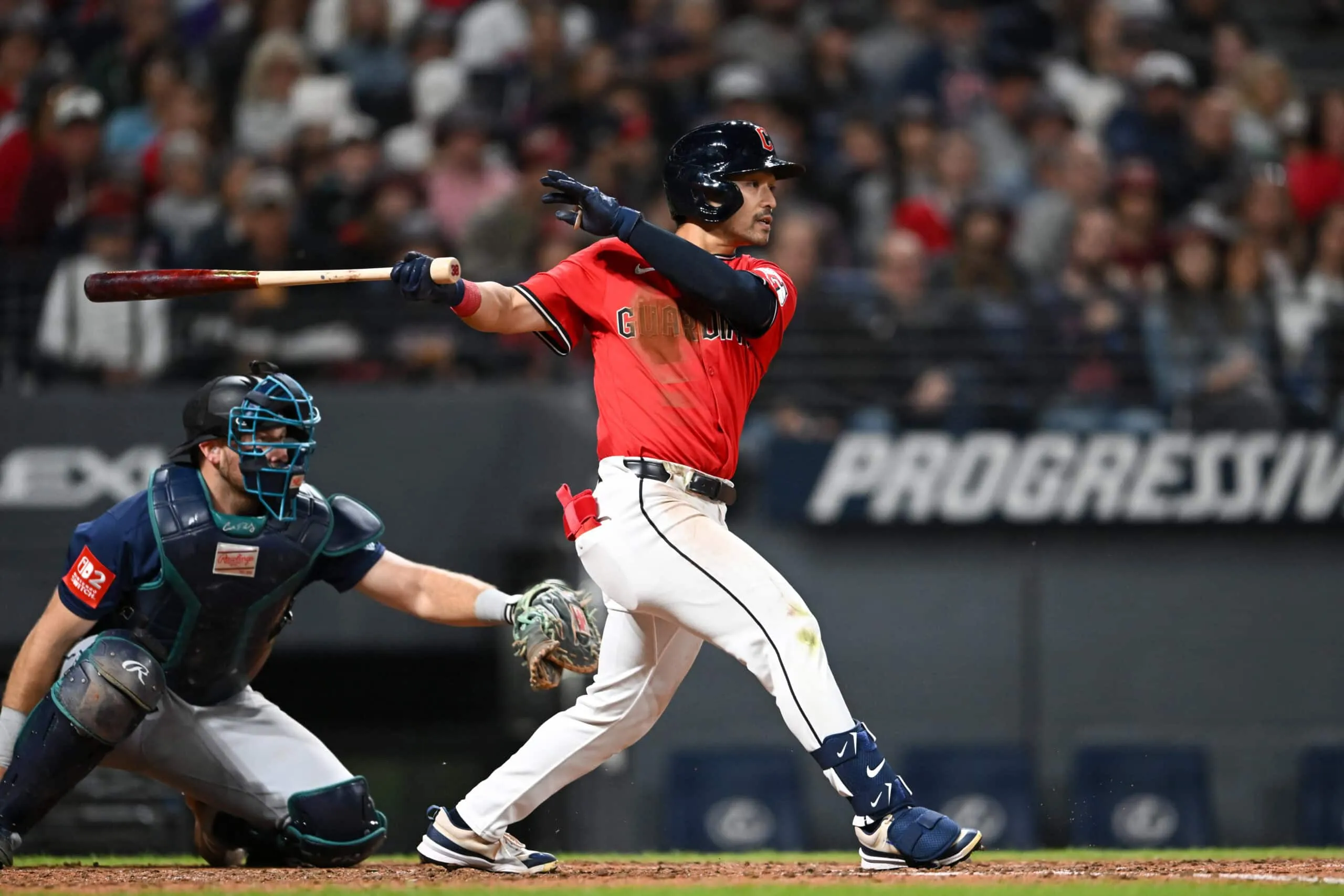CLEVELAND, OHIO - AUGUST 30: Steven Kwan #38 of the Cleveland Guardians hits an RBI single during the seventh inning against the Seattle Mariners at Progressive Field on August 30, 2025 in Cleveland, Ohio.