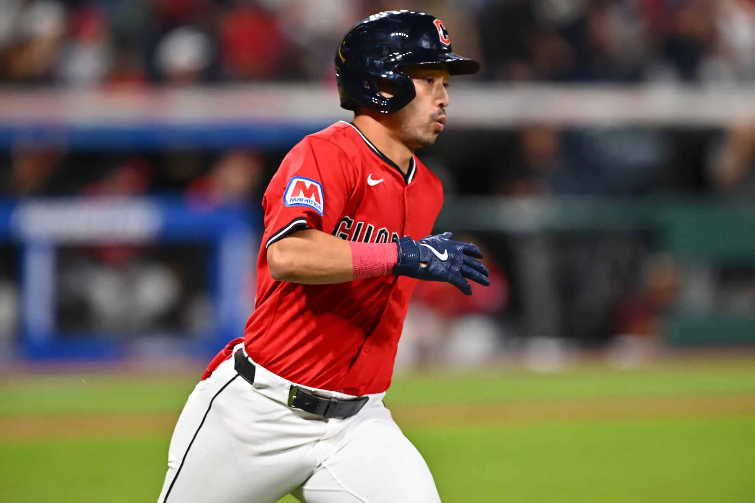 CLEVELAND, OHIO - SEPTEMBER 24: Steven Kwan #38 of the Cleveland Guardians runs out an RBI single during the fifth inning against the Detroit Tigers at Progressive Field on September 24, 2025 in Cleveland, Ohio.