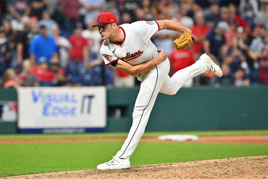 CLEVELAND, OHIO - AUGUST 14: Closing pitcher Cade Smith #36 of the Cleveland Guardians pitches during the ninth inning against the Miami Marlins at Progressive Field on August 14, 2025 in Cleveland, Ohio. The Guardians defeated the Marlins 9-4.