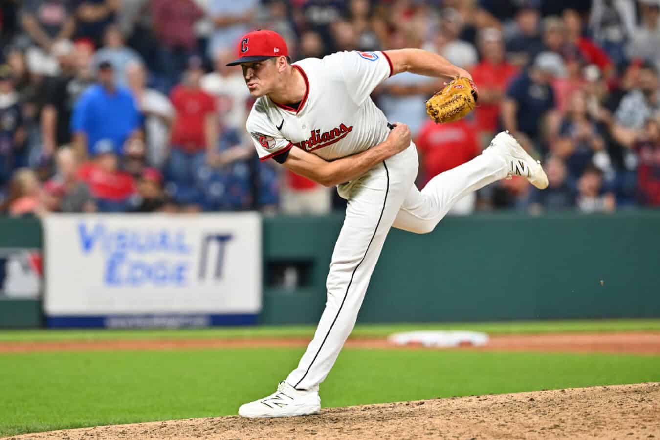 CLEVELAND, OHIO - AUGUST 14: Closing pitcher Cade Smith #36 of the Cleveland Guardians pitches during the ninth inning against the Miami Marlins at Progressive Field on August 14, 2025 in Cleveland, Ohio. The Guardians defeated the Marlins 9-4.
