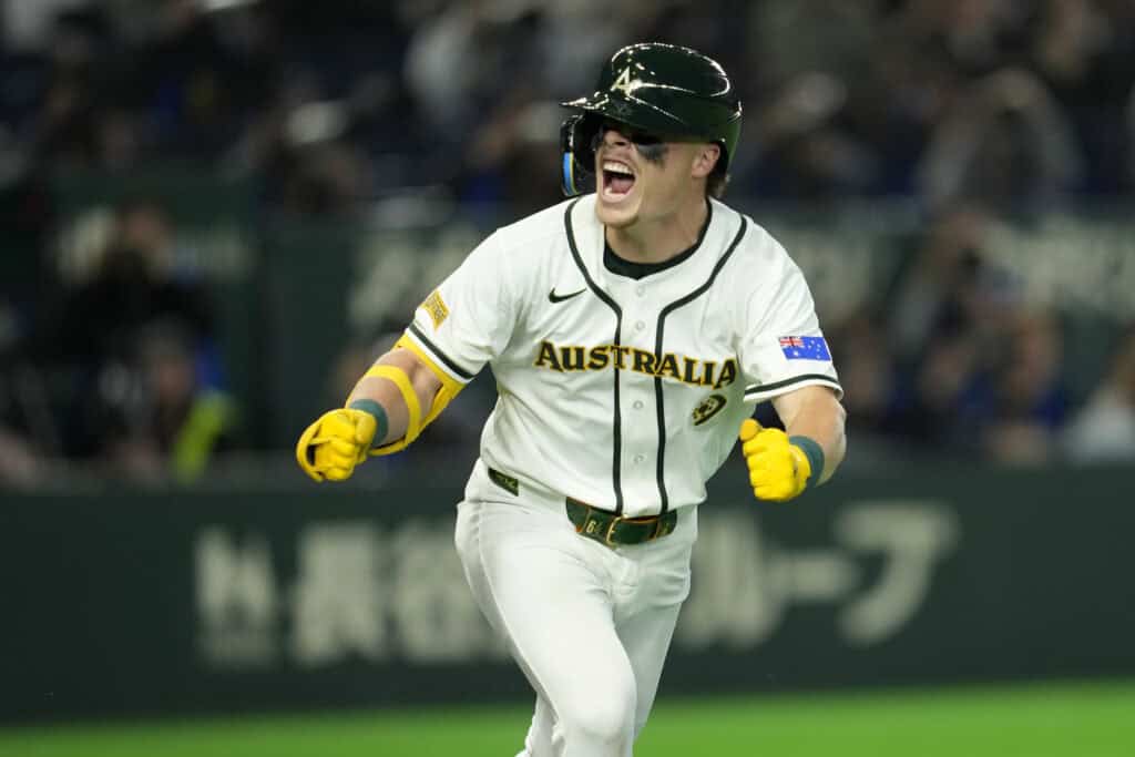 TOKYO, JAPAN - MARCH 09: Travis Bazzana #64 of Team Australia celebrates hitting a RBI single in the eighth inning during the 2026 World Baseball Classic Pool C game between South Korea and Australia at Tokyo Dome on March 9, 2026 in Tokyo, Japan.