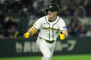 TOKYO, JAPAN - MARCH 09: Travis Bazzana #64 of Team Australia celebrates hitting a RBI single in the eighth inning during the 2026 World Baseball Classic Pool C game between South Korea and Australia at Tokyo Dome on March 9, 2026 in Tokyo, Japan.