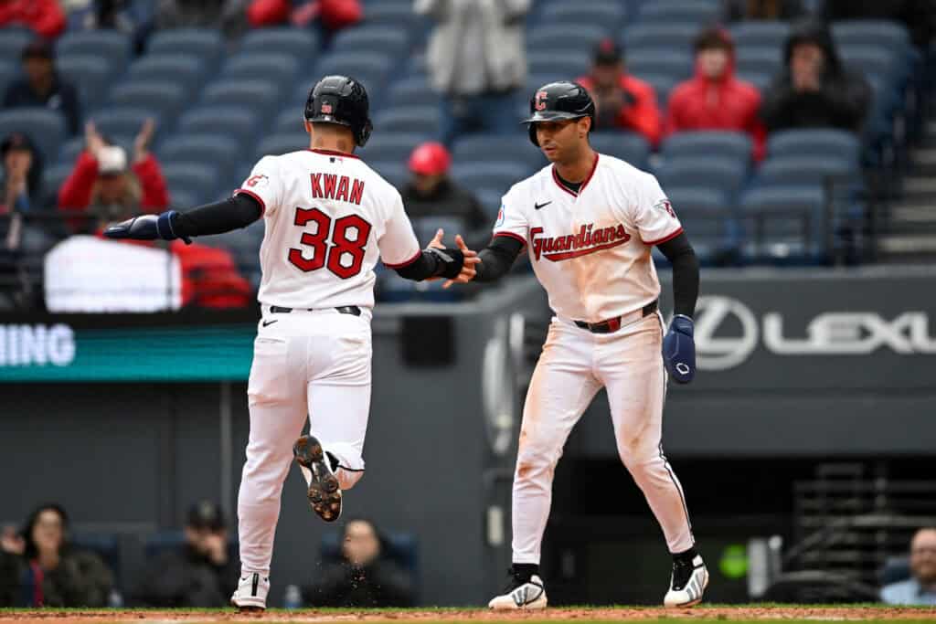 CLEVELAND, OHIO - APRIL 29: Steven Kwan #38 and Brayan Rocchio #4 of the Cleveland Guardians celebrate scoring on a single hit by Chase DeLauter during the fifth inning against the Tampa Bay Rays at Progressive Field on April 29, 2026 in Cleveland, Ohio.