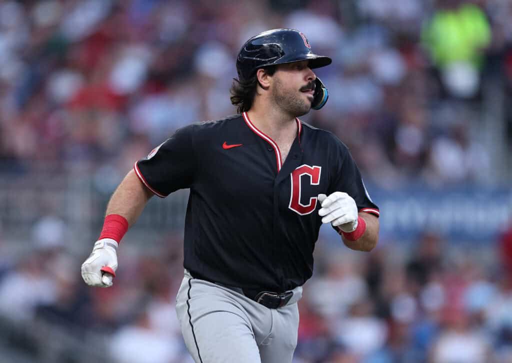 ATLANTA, GEORGIA - APRIL 11: Austin Hedges #27 of the Cleveland Guardians hits a single in the second inning against the Atlanta Braves at Truist Park on April 11, 2026 in Atlanta, Georgia.