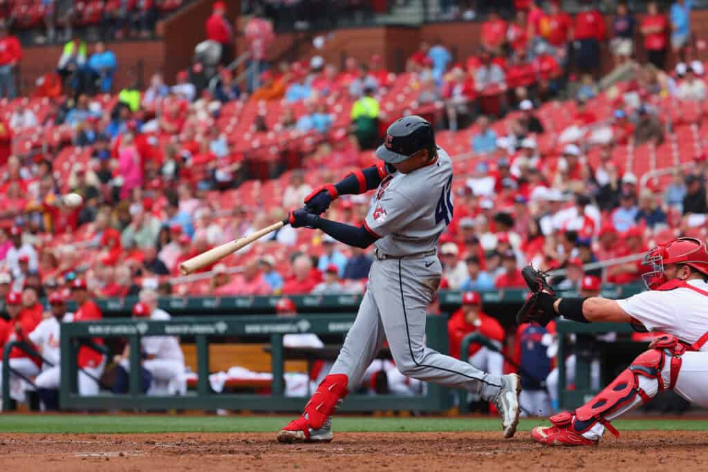ST LOUIS, MISSOURI - APRIL 15: Bo Naylor #23 of the Cleveland Guardians hits a two-RBI double against the St. Louis Cardinals in the seventh inning while wearing the #42 to commemorate Jackie Robinson Day at Busch Stadium on April 15, 2026 in St Louis, Missouri.