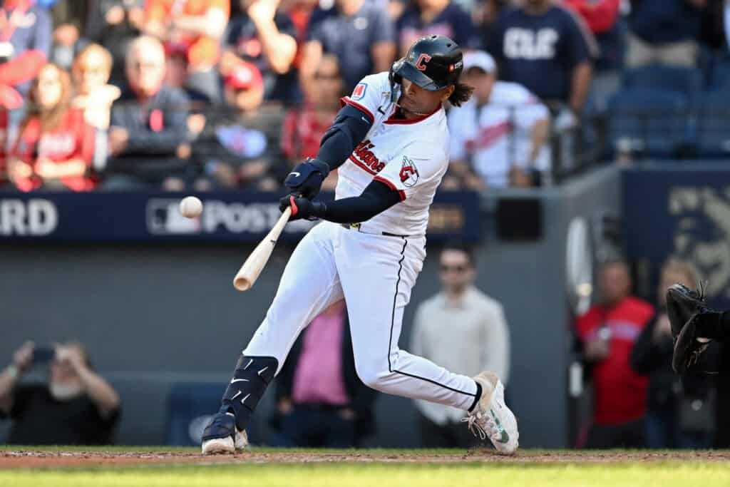 CLEVELAND, OHIO - OCTOBER 01: Bo Naylor #23 of the Cleveland Guardians hits a home run during the eighth inning against the Detroit Tigers in game two of the American League Wild Card Series at Progressive Field on October 01, 2025 in Cleveland, Ohio.
