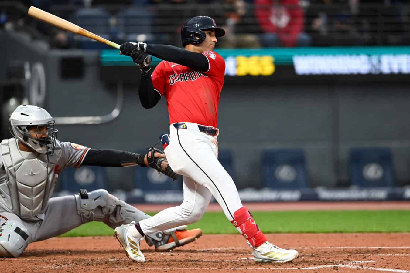 CLEVELAND, OHIO - APRIL 18: Brayan Rocchio #4 of the Cleveland Guardians hits a three-run home run during the fifth inning against the Baltimore Orioles at Progressive Field on April 18, 2026 in Cleveland, Ohio. (