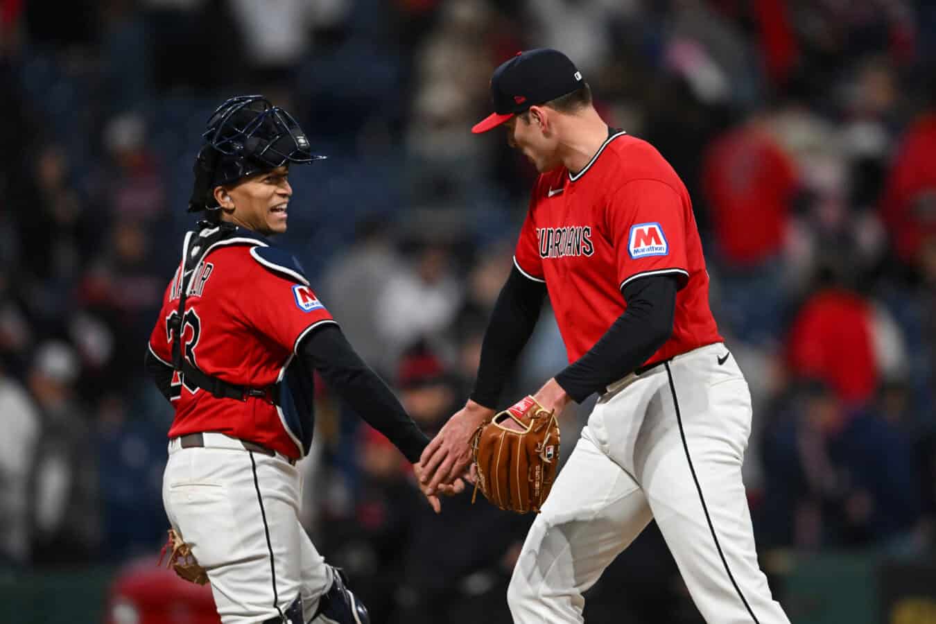 CLEVELAND, OHIO - APRIL 18: Bo Naylor #23 and Cade Smith #36 of the Cleveland Guardians celebrate the team's 4-2 win over the Baltimore Orioles at Progressive Field on April 18, 2026 in Cleveland, Ohio.
