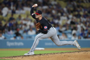 LOS ANGELES, CALIFORNIA - APRIL 01: Cade Smith #36 of the Cleveland Guardians throws against the Los Angeles Dodgers in the ninth inning at Dodger Stadium on April 01, 2026 in Los Angeles, California.