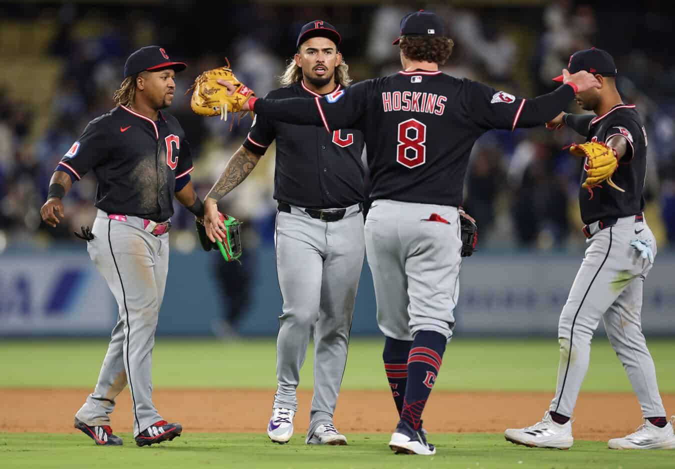 LOS ANGELES, CALIFORNIA - APRIL 01: The Cleveland Guardians celebrate a 4-1 win against the Los Angeles Dodgers at Dodger Stadium on April 01, 2026 in Los Angeles, California.