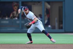 ATLANTA, GEORGIA - APRIL 10: Juan Brito #34 of the Cleveland Guardians makes a play on a ground ball by Ozzie Albies #1 of the Atlanta Braves during the second inning at Truist Park on April 10, 2026 in Atlanta, Georgia.
