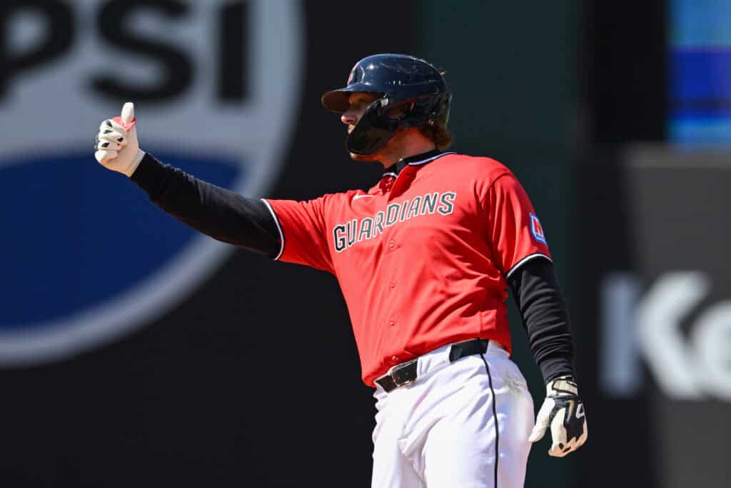 CLEVELAND, OHIO - APRIL 08: Rhys Hoskins #8 of the Cleveland Guardians celebrates hitting a double during the fifth inning against the Kansas City Royals at Progressive Field on April 08, 2026 in Cleveland, Ohio.