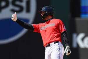 CLEVELAND, OHIO - APRIL 08: Rhys Hoskins #8 of the Cleveland Guardians celebrates hitting a double during the fifth inning against the Kansas City Royals at Progressive Field on April 08, 2026 in Cleveland, Ohio.