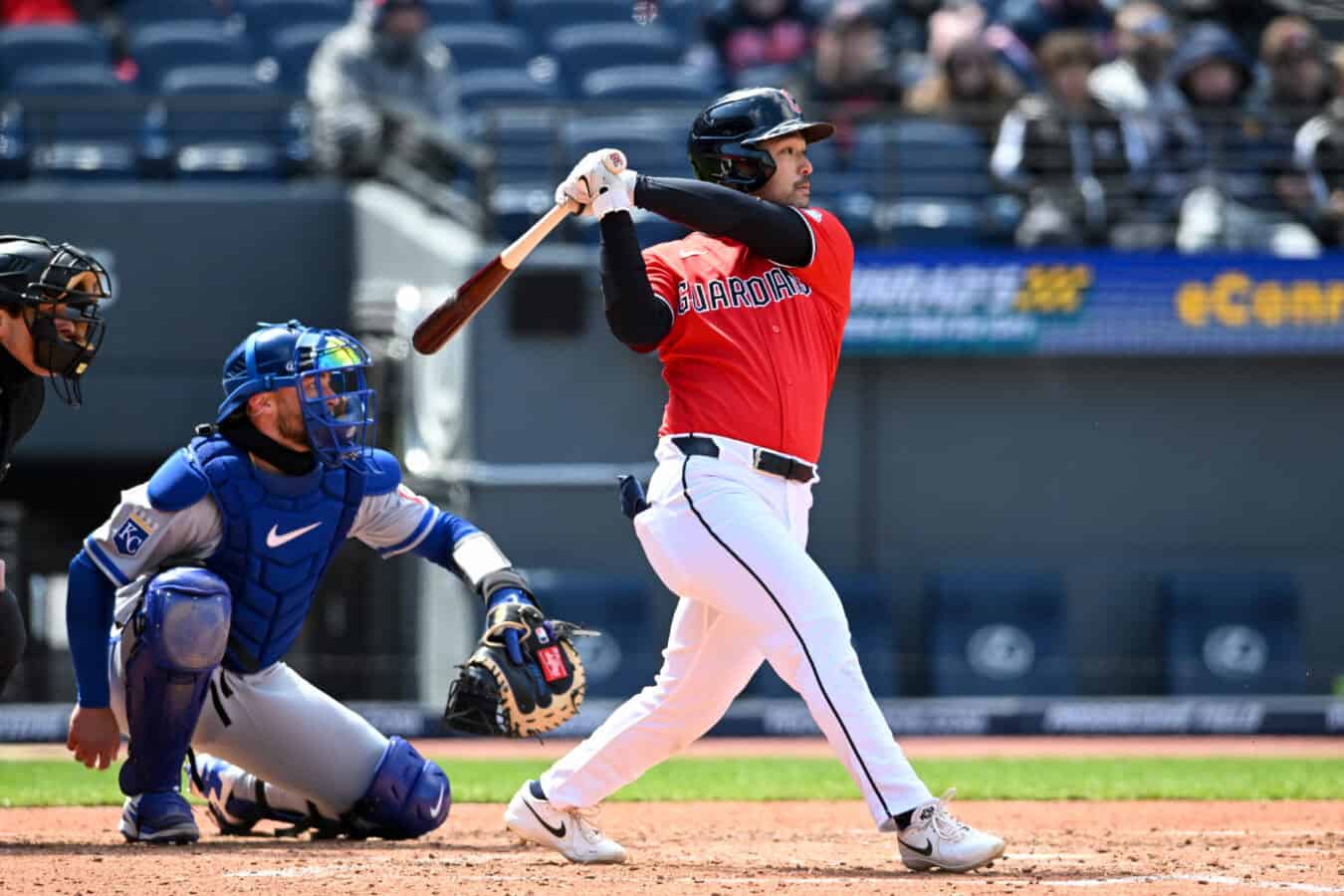 CLEVELAND, OHIO - APRIL 07: Steven Kwan #38 of the Cleveland Guardians hits an RBI single during the fifth inning against the Kansas City Royals at Progressive Field on April 07, 2026 in Cleveland, Ohio.