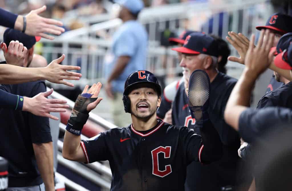 ATLANTA, GEORGIA - APRIL 11: Steven Kwan #38 of the Cleveland Guardians reacts after scoring on a wild pitch by Osvaldo Bido #70 and a throwing error by Jonah Heim #20 of the Atlanta Braves in the ninth inning at Truist Park on April 11, 2026 in Atlanta, Georgia.