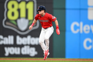 CLEVELAND, OHIO - APRIL 28: Travis Bazzana #37 of the Cleveland Guardians takes a lead at second base during the eighth inning of his Major League debut against the Tampa Bay Rays at Progressive Field on April 28, 2026 in Cleveland, Ohio.