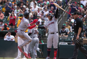 SACRAMENTO, CALIFORNIA - MAY 02: Angel Martínez #1 and Rhys Hoskins #8 of the Cleveland Guardians celebrate after Martinez scored against the Athletics in the top of the fifth inning at Sutter Health Park on May 02, 2026 in Sacramento, California.