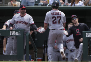 SACRAMENTO, CALIFORNIA - MAY 02: Manager Stephen Vogt #12 of the Cleveland Guardians (L) congratulates Austin Hedges #27 after Hedges hit a solo home run against the Athletics in the top of the third inning at Sutter Health Park on May 02, 2026 in Sacramento, California.